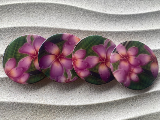 Plumeria print wood coasters with cork bottom. Set of 4 matching