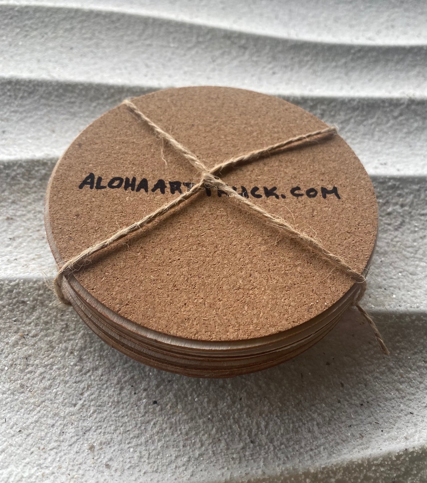 Plumeria print wood coasters with cork bottom. Set of 4 matching